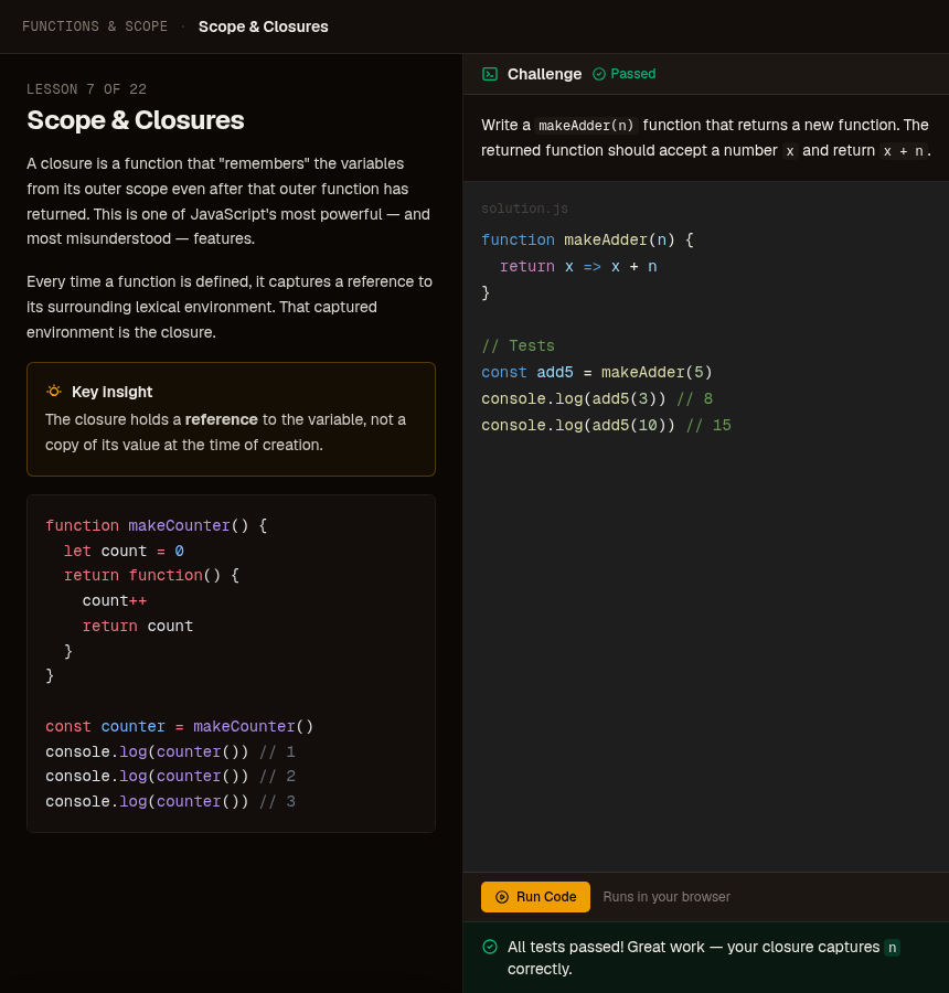 The JavaScript editor running a coding challenge with live output and a passing result